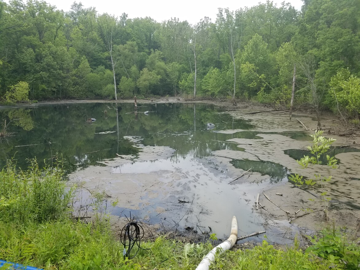 The retention pond near the lake at Winton Woods is being filled with fresh water after the contaminated water was removed.
